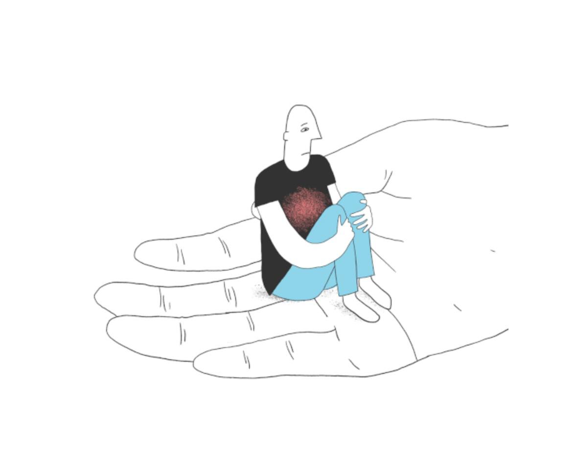 Person held gently in an open hand