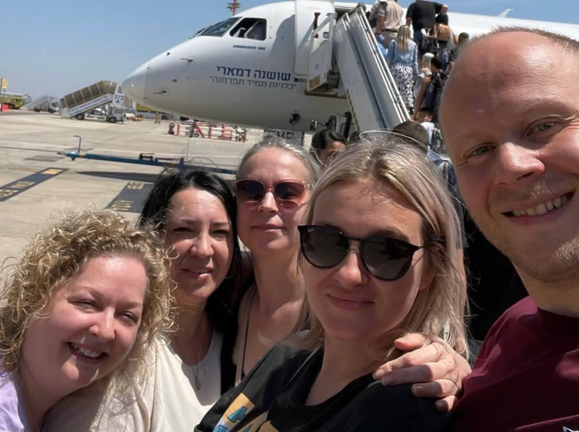 Happy graduates of the fear of flying program + AI companion