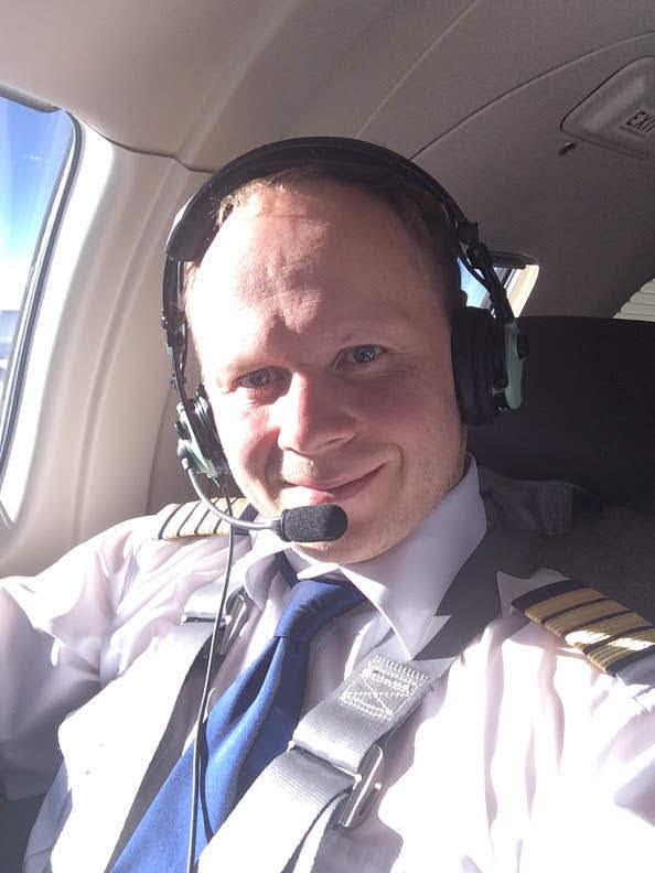 Alex Gervash, pilot and psychotherapist, in the cockpit